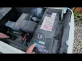 Yellow and green inspect battery maintenance reminder on Generac home standby generator