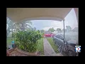 shows car crash into Miami-Dade house
