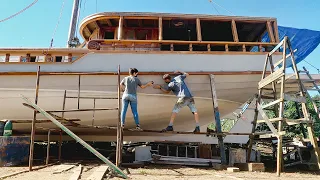 Painting the hull of our rescued wooden sailboat. Which color did we choose? — Sailing Yabá 148