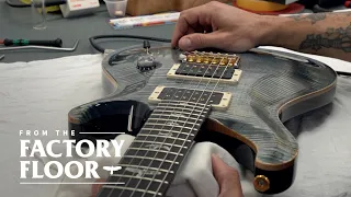 how we quality inspect a guitar from the factory floor prs guitars