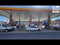 Delaware residents decry high gas prices compare Biden to Carter