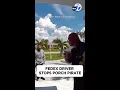 FedEx worker stops porch pirate from taking package