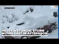 POWER OUTAGES WET SNOW Heavy wet snow storm moves east this afternoon