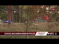Fight erupts on school bus someone outside spotted with gun
