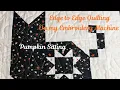 PUMPKIN SITTING QUILT FINISHED USING EDGE TO EDGE QUILTING FROM DESIGNS BY JUJU