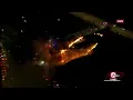 Large fire burning in the parking lot near Arrowhead Stadium