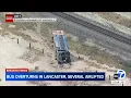 Several injured including child after bus overturns in Lancaster