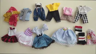 Unboxing cheap clothes for small dolls bjd 16 cm - from China