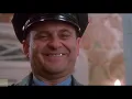 Harry pretends to be a cop Home Alone 1990